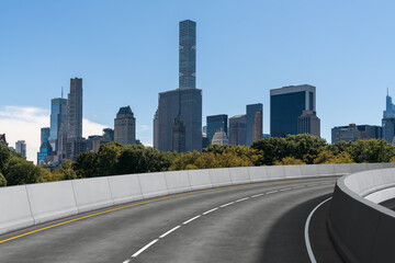 Empty urban asphalt road exterior with city buildings background. New modern highway concrete construction. Concept of way to success. Transportation logistic industry fast delivery. New York. USA.