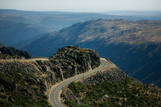 Winding serpentine road in the mountains of the Serra da Estrela or Star Mountain Range in Portugal.