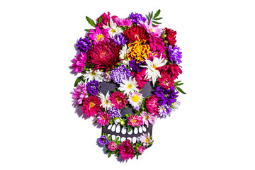 Paper human skull for Mexican Day of the Dead isolated on white. Colorful traditional flowers
