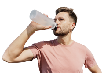 Drinking water from a bottle is a man doing an exercise in fitness clothes and sports running shoes, in full height. An athlete of summer sports. Transparent background, png.
