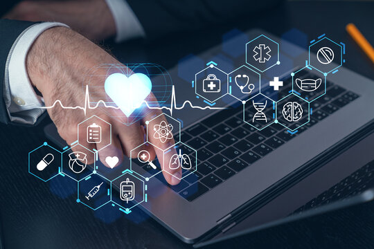 Woman typing on laptop at office workplace in background. Concept of working process, internet surfing, online business education. Student send e-mail. Close up view. Hands Shot. healthcare insurance