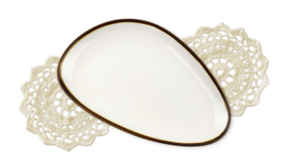 White triangle empty dish with croched doily and shadows isolated on white or transparent background