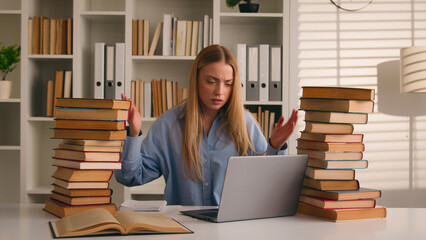 Stressed angry tired Caucasian student girl woman stressful learner business corporate studying with laptop and books problem bad result homework prep to exams learning trouble e-learning difficulties