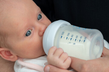 Tender Fatherly Moments: Bottle-Feeding Newborn