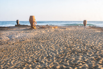 Greek Amphorae Resting on the Beach Malia Beach - Crete - July - 2023