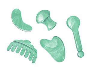 Green gua sha tools for facial acupuncture massage. © Alina