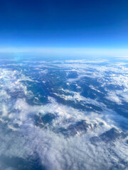 Fototapeta premium Cloudy sky, view from the airplane window