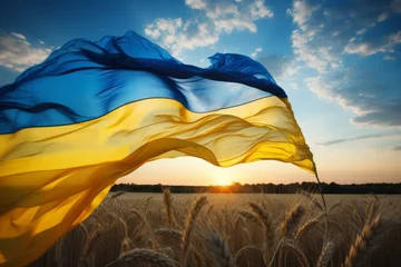 Fotobehang Flag of Ukraine in a field of wheat. Grain deal concept. Hunger and food security of the world. © top images