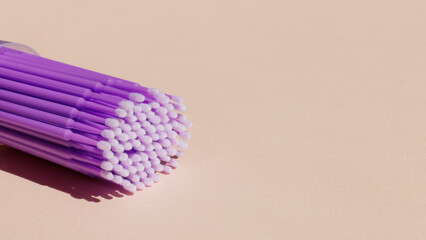 Lots of purple microbrushes. Place for text.