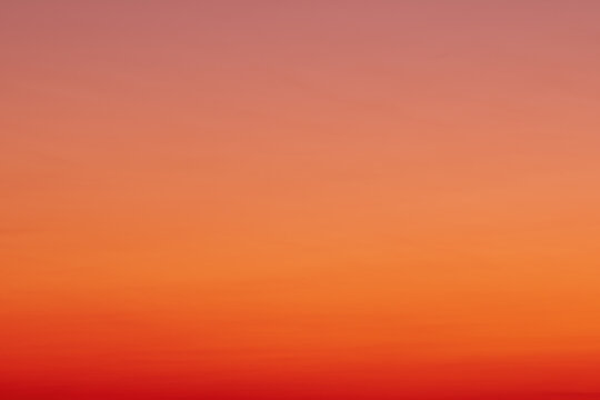 Sky gradient from orange to red sunset, photography nature sunset background