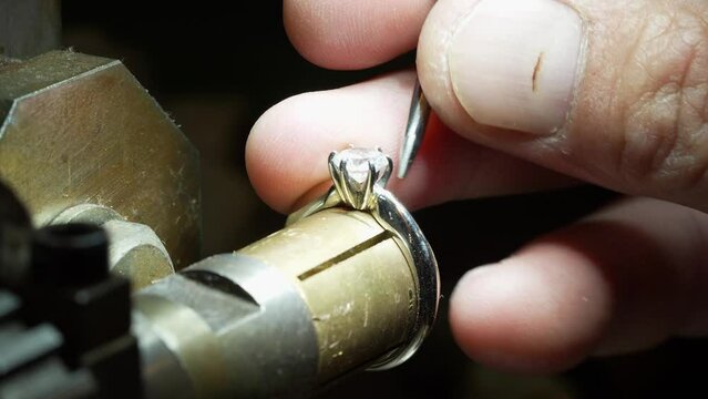 goldsmith jewelry ring making process ajdusting and polish gold ring
