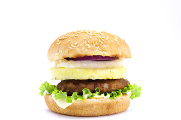 A hawaiian style hamburger with pineapple in the middle. Hawaiian burger isolated on white background.