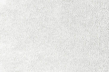 Fototapeta na wymiar Terry cloth, white towel texture background. Soft fluffy textile bath or beach towel material. Top view, close up.