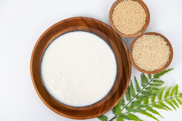 Selective focused image of fermented batter for idli and dosa in an isolated background. Idly and dosa batter in a bowl for fermentation, used to prepare the dosa and idli..