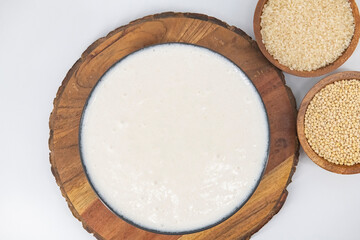 Selective focused image of fermented batter for idli and dosa in an isolated background. Idly and dosa batter in a bowl for fermentation, used to prepare the dosa and idli..