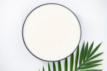 Selective focused image of fermented batter for idli and dosa in an isolated background. Idly and dosa batter in a bowl for fermentation, used to prepare the dosa and idli..