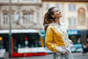  woman in Prague Czech Republic on tram station and walking © Alliance
