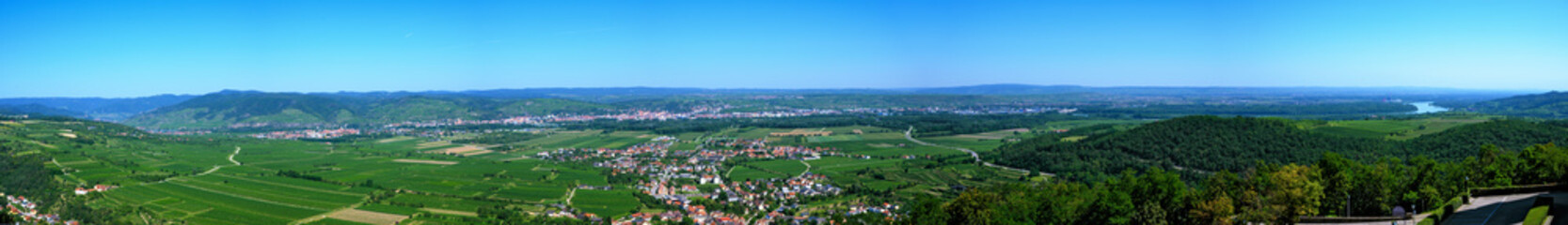 Fototapeta premium Panoramic view across the Danube valley seen from the terrace of the abbey Goettweig on a sunny summer day, Austria