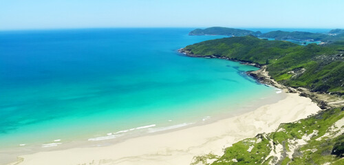 Obraz premium high angle view of sea and sand Ocean and mountains 3D illustration