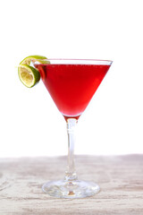 Red Cocktail And Lime Isolated On White. Cosmopolitan.Vertical