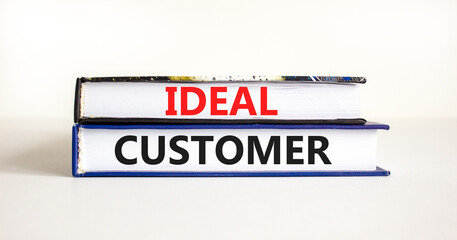 Ideal customer symbol. Concept words Ideal customer on beautiful books. Beautiful white table white background. Business ideal customer concept. Copy space.