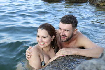 Beautiful couple in the water  