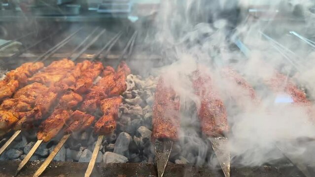 skewered meat cooked in embers in restaurants