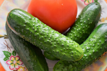 background of fresh tomatoes and cucumbers