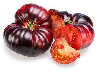 Ripe black or purple tomatoes and tomatoes slices isolated on white background.