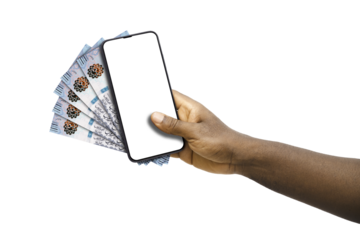 Black hand holding mobile phone with blank screen and Saudi Riyal notes
