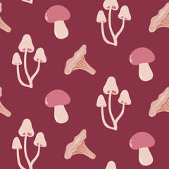 Seamless pattern of doodle boletus, chantarelle and fairy ring mushrooms on isolated background. Hand drawn background for Autumn harvest holiday, Thanksgiving, Halloween. 