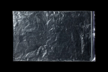 Transparent plastic bag isolated on black background.