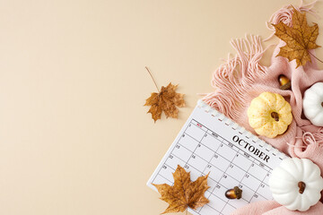 Delight in the cozy embrace of autumn within your home. Top view photo of calendar, warm pink...