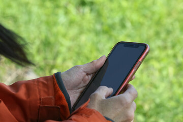 person holding mobile phone
