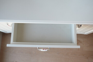 top view of a opened empty drawer 