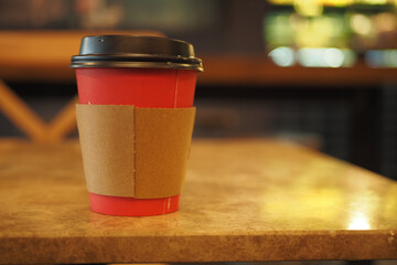 Blank take away kraft coffee cup on table ,