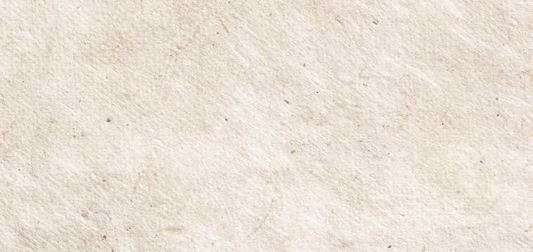Textured beige wrinkled handmade paper background. Horizontal banner, background for design