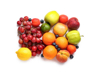 Composition with fresh fruits and berries on white background