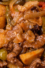 Delicious fresh stew of potatoes, tomatoes, onions, carrots and beef