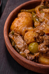 Delicious fresh stew of potatoes, tomatoes, onions, carrots and beef