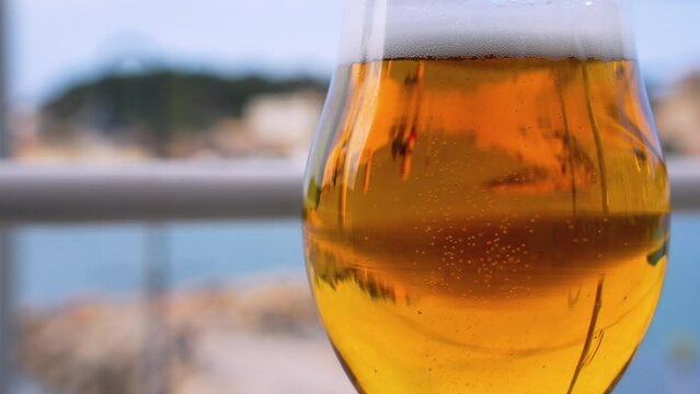 Drinking beer looking at the beach