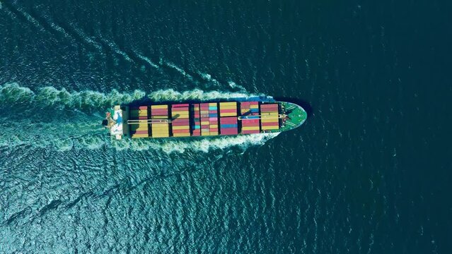 Aerial top view large cargo vessel ships, freight ship full of containers, shipping import export cargo, sea transport logistics carriage