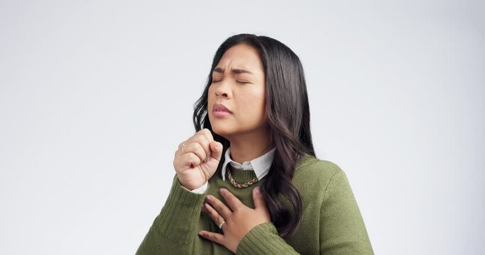 Sick, cough and woman in studio with pain in chest, cold and bacteria of virus on white background. Model coughing for asthma attack, tuberculosis and sore throat of allergy, influenza and pneumonia