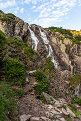Fototapeta na wymiar Alpine waterfall 