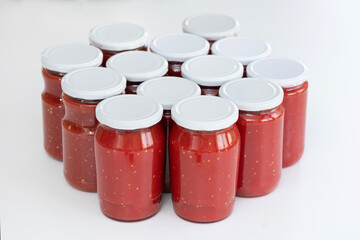 Homemade tomato sauce in the jars traditional prep for the winter months.