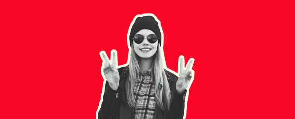 Fashion portrait of happy smiling blonde woman in rock black style on red background, magazine style
