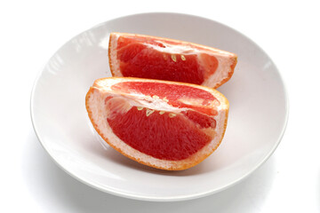 Fresh grapefruit on white background.