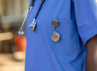 African nurse with a specialized FOB watch