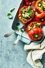 Peppers stuffed with minced meat, rice and vegetables. Topped with herbs and feta cheese