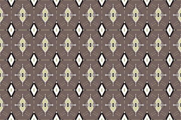 Ikat embroidery on grey background.